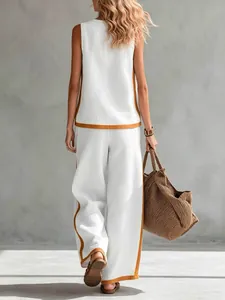 Back view of a chic white and tan color-block sleeveless top and wide-leg trousers set