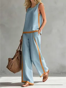 Casual blue sleeveless top and wide-leg trousers set with orange contrast piping