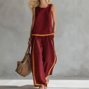 Elegant burgundy sleeveless top and wide-leg pants two-piece set with yellow contrast trim