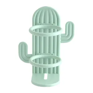 Wall-mounted pale green cactus-shaped electric toothbrush holder with drainage design