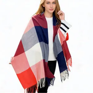 Warm cashmere-like plaid shawl for women with fringe detail in red and navy colors