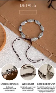 Macro detail of ethnic handmade adjustable woven fish bracelet showing relief patterns and knots