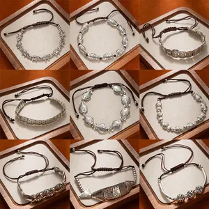 Handmade ethnic style adjustable woven bracelets with vintage silver animal charms