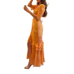 Robe fleurie vintage française orange élégante avec fente et ourlet à volants