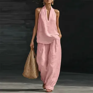 Elegant pink linen-style halter top and wide-leg trousers two-piece set for women
