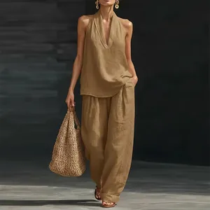 Detailed full body shot of a stylish khaki linen halter top paired with wide-leg pants