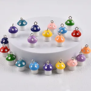 Variety of colorful resin mushroom charms with silver loops for DIY jewelry making