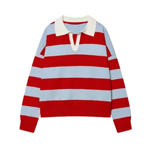 Detailed view of long-sleeved knit polo sweater with bold red and blue horizontal stripes.