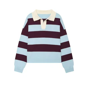 Close-up of a blue and maroon striped knit sweater with a cream polo collar