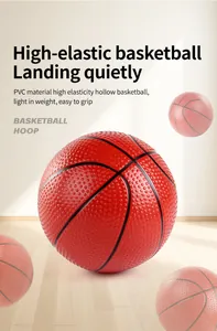 Detailed view of high-elastic red PVC basketball with anti-slip dimpled texture for kids