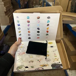 Detailed view of the 24-day Christmas advent calendar featuring various natural stones.