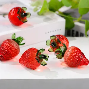 Set of translucent red glass strawberry figurines for elegant home decor and gifts