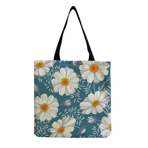 Large capacity tote bag with white daisy floral print on teal background