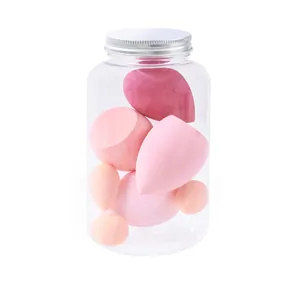Set di spugnette per trucco rosa in un barattolo di plastica per un finish perfetto
