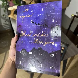 Close-up of a 24-day Christmas advent calendar blind box with purple starry design