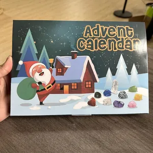 Front view of Christmas stone advent calendar gift box with colorful gemstones