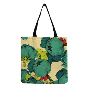 Detailed view of the vibrant floral print on this durable canvas tote shopping bag.