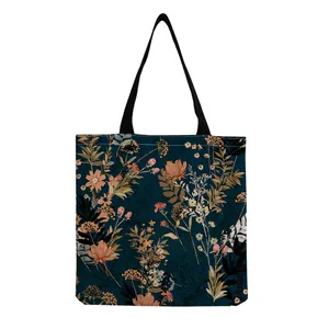 Macro detail of a large canvas tote bag with vintage floral and botanical prints