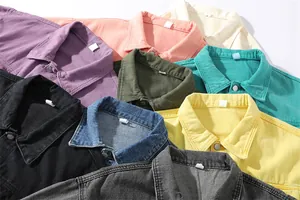 Detailed view of various colorful men's denim jacket collars and washed fabric.