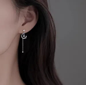 Elegant 925 sterling silver asymmetrical moon and star tassel earrings with moonstone