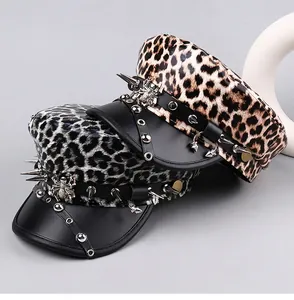 Detail of punk leopard print flat-top hats with long metal spikes and spider decor