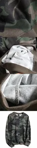 Detailed macro view of men's camouflage sweatshirt fabric texture and inner fleece quality