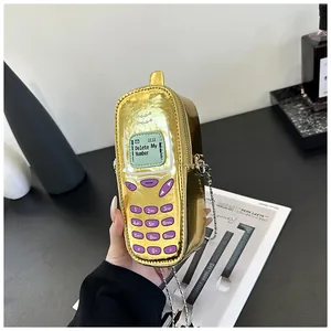 Niche fashion creative gold metallic retro phone shaped mini crossbody bag for women