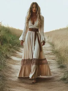 Bohemian V-neck lace patchwork maxi dress with flare sleeves in natural field setting