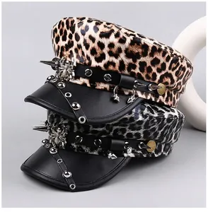 Detailed view of leopard print punk flat-top hats with silver studs and spider