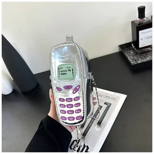 Unique vintage phone shaped silver mini crossbody bag with metallic finish for women
