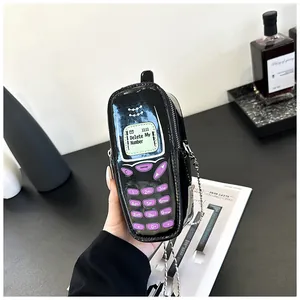 Vintage mobile phone shaped mini crossbody bag in glossy black patent leather material