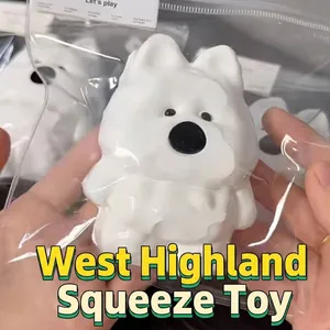 Close-up of white West Highland dog slow rebound squishy toy with cream texture