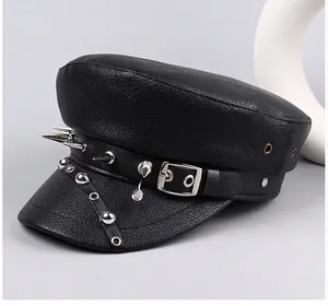 Detail view of a black leather punk military hat featuring long silver metal spikes