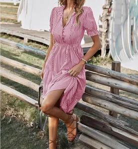 Detailed view of pink and white vertical striped summer dress with V-neck buttons