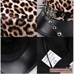 Macro detail of punk leopard military cap with spider ornament and adjustable strap.