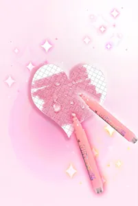 Pink glitter highlighter pen showing waterproof shimmer effect on heart grid paper