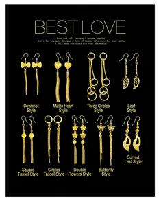 Various styles of gold tassel drop earrings shown on a premium black background