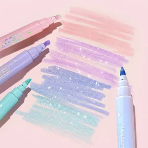 Detailed view of four colorful glitter highlighter pens showing shiny ink strokes on paper.