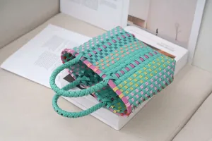 Colorful handcrafted woven plastic tote basket bag with contrast checkered pattern