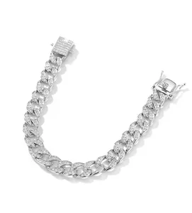Close-up of 925 sterling silver moissanite Cuban link bracelet with full diamond inlay