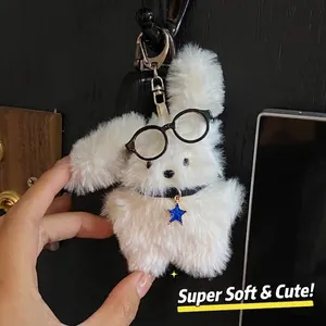 Adorably soft fluffy white bunny plush keychain with black glasses and blue star charm