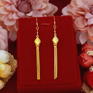 Elegant long gold tassel drop earrings with geometric diamond design for fashion women
