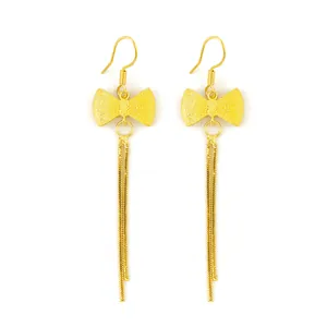 Elegant gold bow tassel earrings for women with long dangling fringe in minimalist style