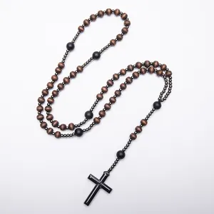 Handcrafted religious wood bead rosary necklace featuring a black hematite cross pendant