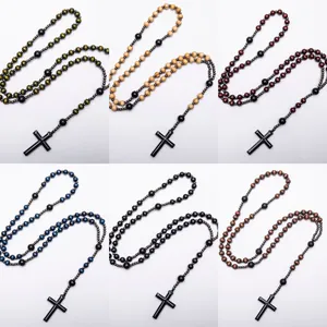 Set of 6 assorted wooden bead rosary necklaces featuring black gallstone cross pendants