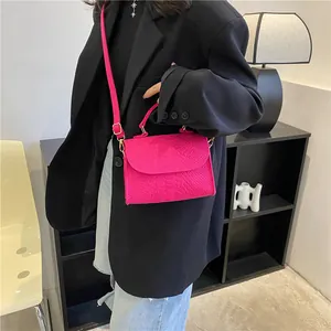 Trendy fuchsia pink snake pattern crossbody bag for women with top handle strap