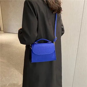 Bright blue snakeskin embossed felt crossbody handbag for women