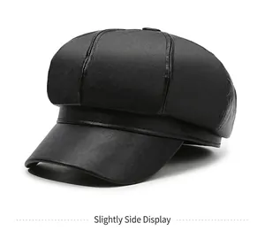 Close-up side view detail of a black vintage PU leather newsboy cap with textured finish