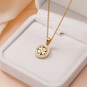 Elegant gold-plated titanium steel four-leaf clover necklace with sparkling rhinestones.