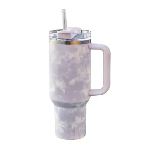 Close-up of 40oz insulated tumbler featuring lavender tie-dye marble pattern.